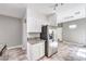 Charming kitchen featuring stainless steel refrigerator and granite countertops at 1634 Clint Canyon Dr, Henderson, NV 89002