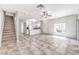 Open floor plan features tile flooring and access to the kitchen and staircase at 1634 Clint Canyon Dr, Henderson, NV 89002