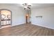 Expansive primary bedroom featuring arched doorway and stylish en-suite bathroom at 1634 Clint Canyon Dr, Henderson, NV 89002