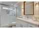 Modern bathroom features a glass shower, white countertop, and stylish finishes at 2033 Shining Feather Ln, Las Vegas, NV 89134