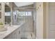 Modern bathroom boasts a glass shower, white countertop, and stylish finishes at 2033 Shining Feather Ln, Las Vegas, NV 89134