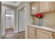 Hallway featuring built-in storage and doorway to a bathroom at 2033 Shining Feather Ln, Las Vegas, NV 89134