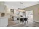Bright kitchen featuring stainless steel appliances, a large island, and a sliding door to the backyard at 2033 Shining Feather Ln, Las Vegas, NV 89134