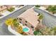An aerial showcases a private pool, mature landscaping and large windows inviting natural light at 2337 Ivory Point Ct, Las Vegas, NV 89134