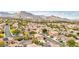Beautiful aerial view of the property in a well-planned community with mountain views at 2337 Ivory Point Ct, Las Vegas, NV 89134