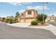 Landscaped two-story stucco home with a three-car garage on a cul-de-sac at 2337 Ivory Point Ct, Las Vegas, NV 89134