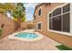 Private backyard with a small pool and patio area, perfect for relaxation at 2337 Ivory Point Ct, Las Vegas, NV 89134