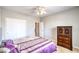 Bedroom featuring a ceiling fan, closet, and hard surface floors at 2413 Hamonah Dr, Henderson, NV 89044