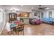 Open-concept living space seamlessly integrates the kitchen, dining area, and comfortable seating at 2413 Hamonah Dr, Henderson, NV 89044