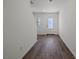 Inviting entryway featuring modern wood flooring, leading to a brightly lit interior at 2605 Freya Valley St, Las Vegas, NV 89156