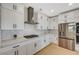 Modern kitchen featuring stainless steel appliances, white cabinets and stylish countertops at 2740 High Range Dr, Las Vegas, NV 89134