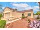Single-story home featuring a well-maintained yard, with desert landscaping for low maintenance at 2810 Lava Rock Ave, North Las Vegas, NV 89031