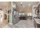 Spacious kitchen featuring stainless steel appliances, ample counter space, and an adjacent dining area at 2810 Lava Rock Ave, North Las Vegas, NV 89031