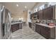An efficient kitchen with stainless appliances, ample counter space, and updated cabinets at 2810 Lava Rock Ave, North Las Vegas, NV 89031