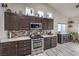 Beautiful kitchen features ample cabinetry, stainless steel appliances and updated countertops at 2810 Lava Rock Ave, North Las Vegas, NV 89031