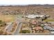 Panoramic aerial view highlighting the home's location near community facilities and surrounding residential area at 319 Belfast St, Henderson, NV 89015