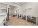Open office area with two workstations, tile flooring, and decorative giraffe statues at 319 Belfast St, Henderson, NV 89015