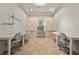 Well-lit office with dual desks, built-in cabinets, and a window providing natural light at 319 Belfast St, Henderson, NV 89015