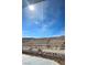 Enjoy desert views from the backyard patio with rock accents at 3213 Partridge Run St, Laughlin, NV 89029