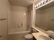 Bathroom featuring a shower-tub combination and a single sink vanity at 3213 Partridge Run St, Laughlin, NV 89029