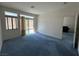 Bright bedroom features large windows and sliding glass doors to backyard at 3213 Partridge Run St, Laughlin, NV 89029
