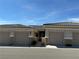 Charming home featuring a neutral stucco exterior, tile roof, and a well-maintained, private front entrance at 3213 Partridge Run St, Laughlin, NV 89029