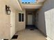 Inviting front entry featuring a covered porch area, with direct access to an additional side entry door at 3213 Partridge Run St, Laughlin, NV 89029
