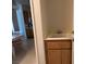 Convenient laundry sink and cabinet offer functionality and storage adjacent to dining area at 3213 Partridge Run St, Laughlin, NV 89029