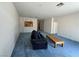 Bright living room with cozy fireplace, large windows, and comfortable carpet flooring at 3213 Partridge Run St, Laughlin, NV 89029