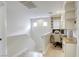 Upstairs landing with a built-in desk and bright natural light at 3650 Mcmurty Ct, Las Vegas, NV 89129
