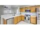 Spacious kitchen featuring stainless steel appliances and light wood cabinetry at 3650 Mcmurty Ct, Las Vegas, NV 89129