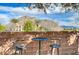 Backyard deck with seating and mountain views at 3734 John Bailey St, Las Vegas, NV 89129