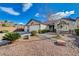 Charming home featuring a well-manicured yard with rocks and stone, offering curb appeal at 3734 John Bailey St, Las Vegas, NV 89129