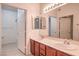 Bathroom with dual sinks, updated vanity, and a full-size shower and bath at 3925 Lazy Pine St # 204, Las Vegas, NV 89108