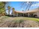 Spacious backyard with green grass and mature trees provides privacy and space for outdoor activities at 4300 Del Monte Ave, Las Vegas, NV 89102