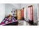 Bedroom features hardwood floors and a door with a window letting in natural light at 4300 Del Monte Ave, Las Vegas, NV 89102