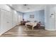 Dining room with wood floor and light blue walls at 4300 Del Monte Ave, Las Vegas, NV 89102