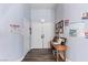 Well-lit entryway featuring clean lines, a wood-look floor, and practical furnishings at 4300 Del Monte Ave, Las Vegas, NV 89102