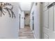 Hallway with wood floor and doors leading to rooms at 4300 Del Monte Ave, Las Vegas, NV 89102
