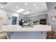 Modern kitchen featuring ample counter space, stainless steel appliances, and skylights for natural lighting at 4300 Del Monte Ave, Las Vegas, NV 89102