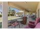 Inviting covered patio with an outdoor sitting area and a view of the well-maintained backyard at 4300 Del Monte Ave, Las Vegas, NV 89102