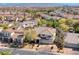 Aerial view of a desert community home featuring mature landscaping and a private driveway at 4481 Grey Spencer Dr, Las Vegas, NV 89141
