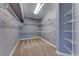 Walk-in closet with built-in shelving and ample storage space at 4481 Grey Spencer Dr, Las Vegas, NV 89141