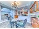 Charming kitchen view featuring granite countertops, stainless steel appliances, and a cozy breakfast nook at 4481 Grey Spencer Dr, Las Vegas, NV 89141