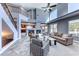 Large living room boasting high ceilings, fireplace, and a staircase leading to the upper level at 4481 Grey Spencer Dr, Las Vegas, NV 89141