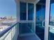 Modern balcony featuring glass railings and sliding door access to city views at 4575 Dean Martin Dr # 1201, Las Vegas, NV 89103