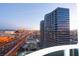 Breathtaking city view from a high-rise balcony at dusk, with city lights twinkling at 4575 Dean Martin Dr # 1201, Las Vegas, NV 89103