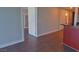 Spacious living room leading to the kitchen area with hardwood floors at 4575 Dean Martin Dr # 1201, Las Vegas, NV 89103
