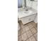 Bathroom featuring a vanity with white cabinets and a speckled countertop at 503 Crony Ave, Henderson, NV 89011