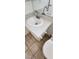 Bathroom featuring a granite countertop sink and a mirror at 503 Crony Ave, Henderson, NV 89011